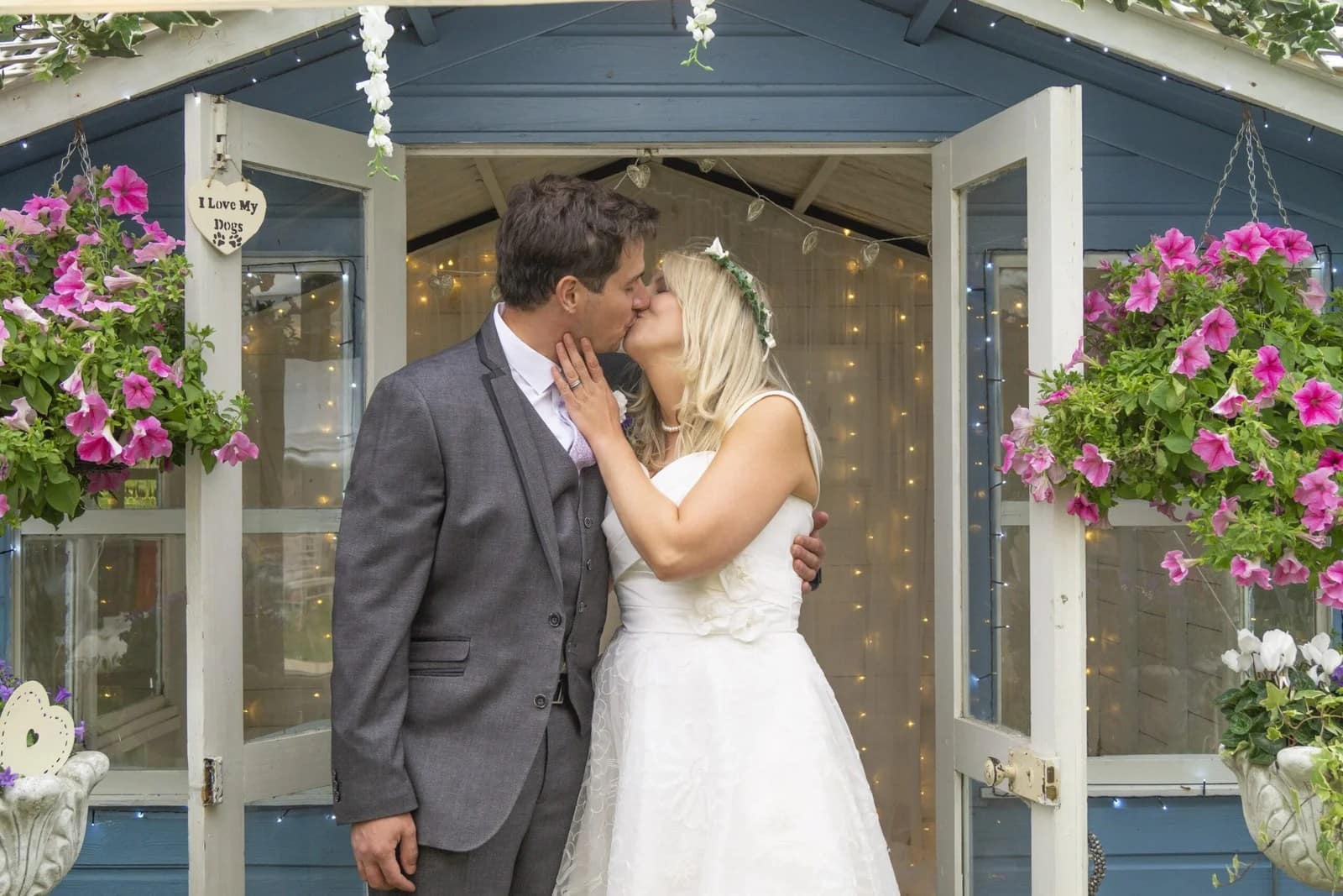 A husband and wife kissing, love & life photography portfolio