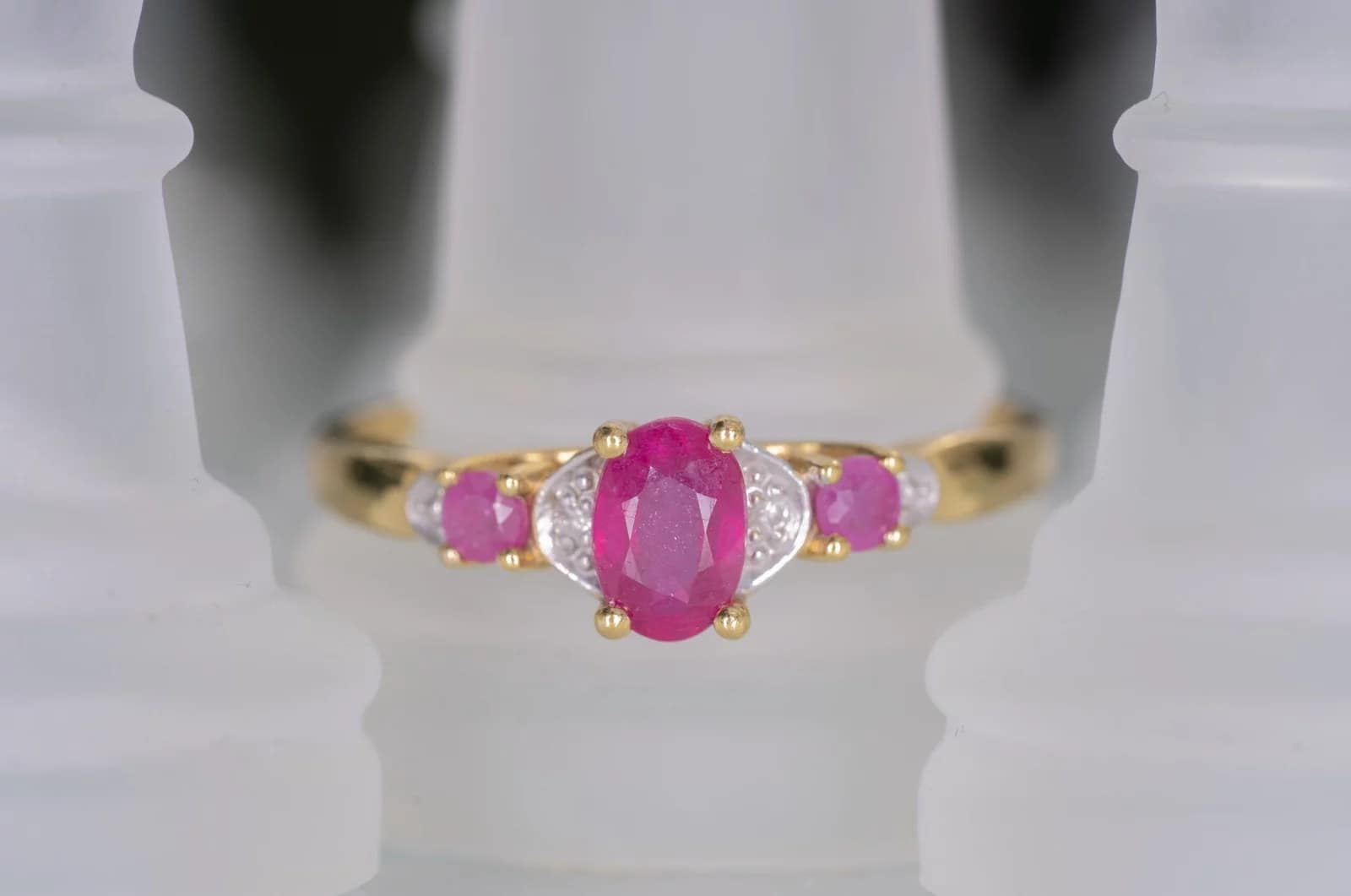 A ruby ring on a chess piece, in close-up photography portfolio