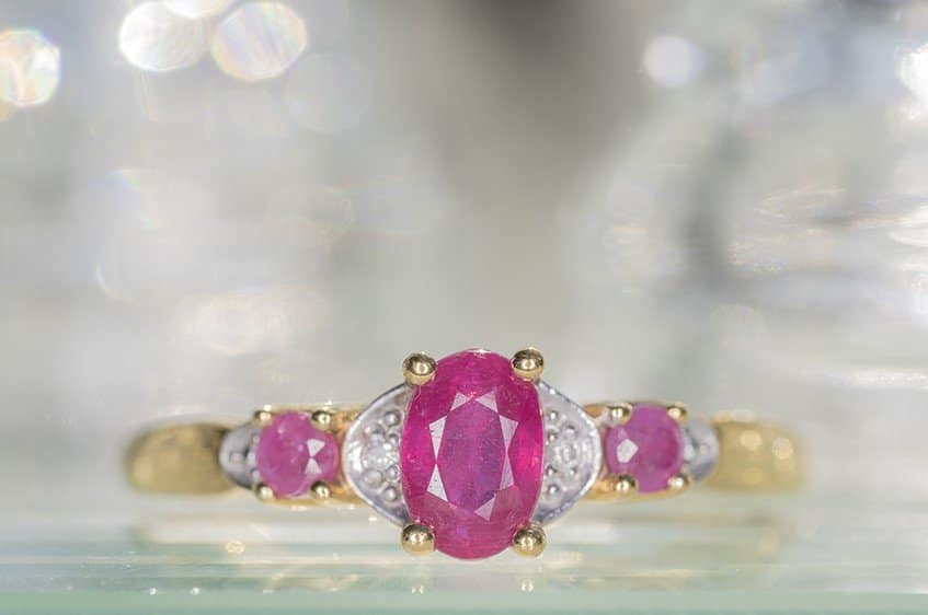 A close-up image of a ruby ring. Product photography packages